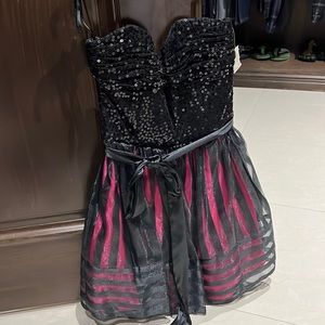 Brand new with tags Betsy Johnson dress.